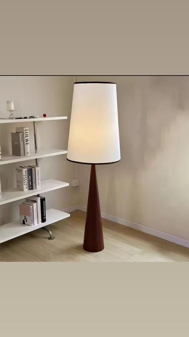 Floor lamp with a tapered wooden base