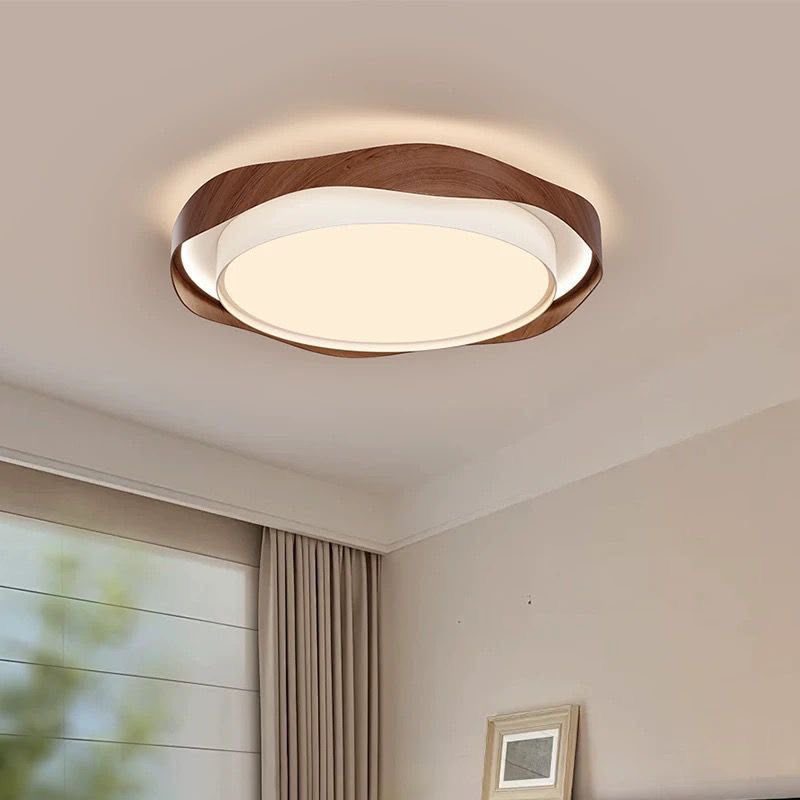 Round flush-mount ceiling light with a solid wood frame