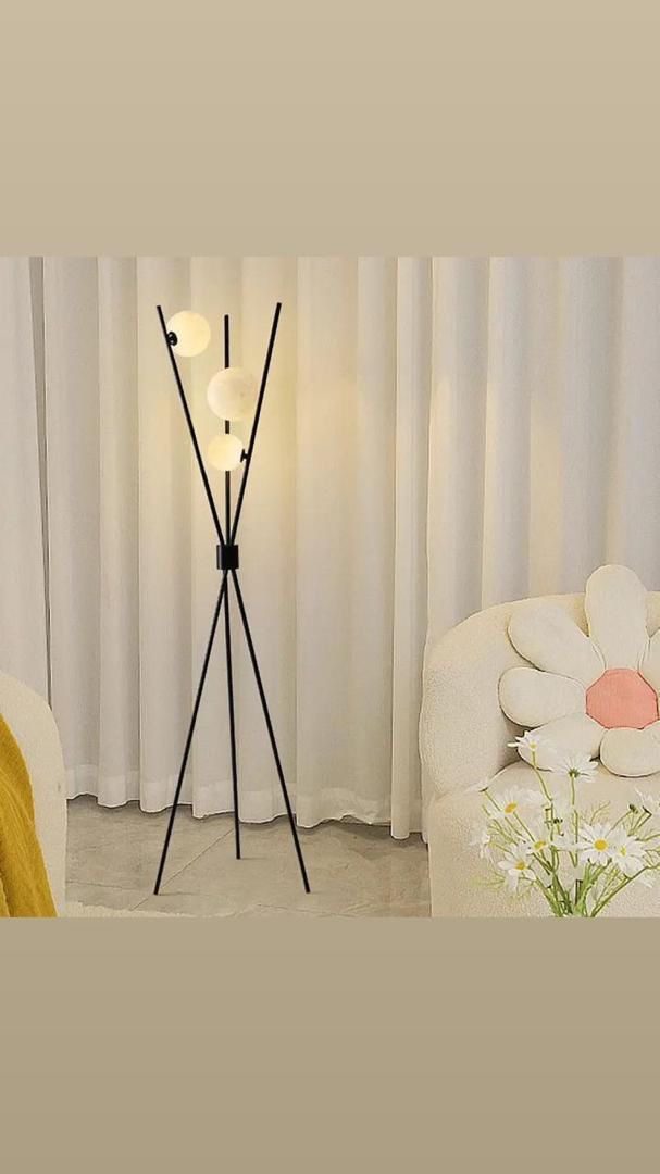 Tripod floor lamp with several branching arms