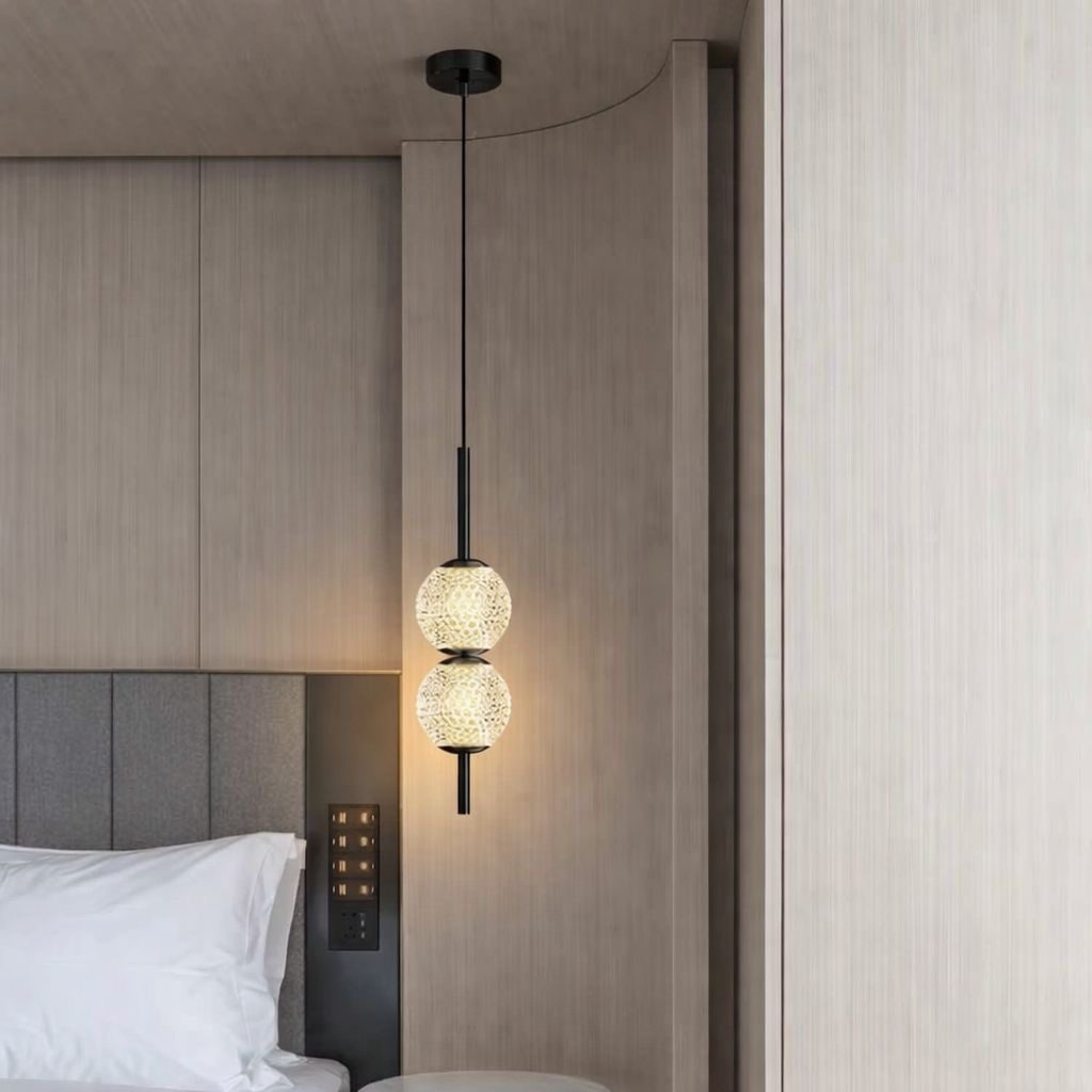Pendant light with two textured globe shades
