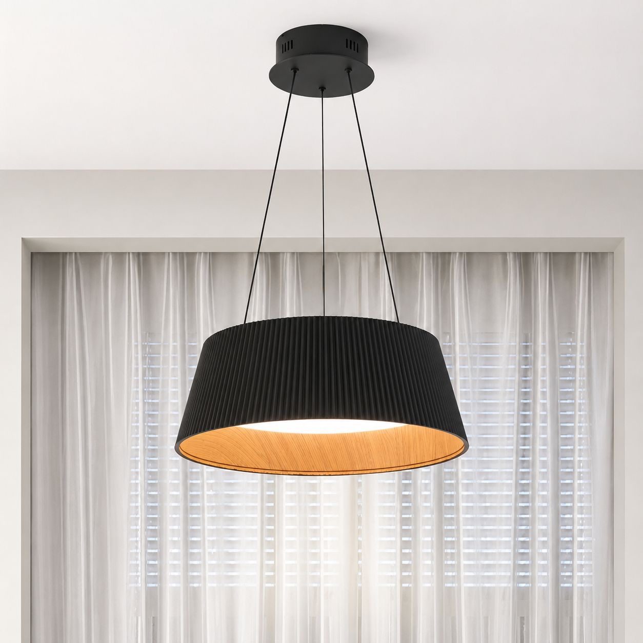 Black cylindrical drum pendant light