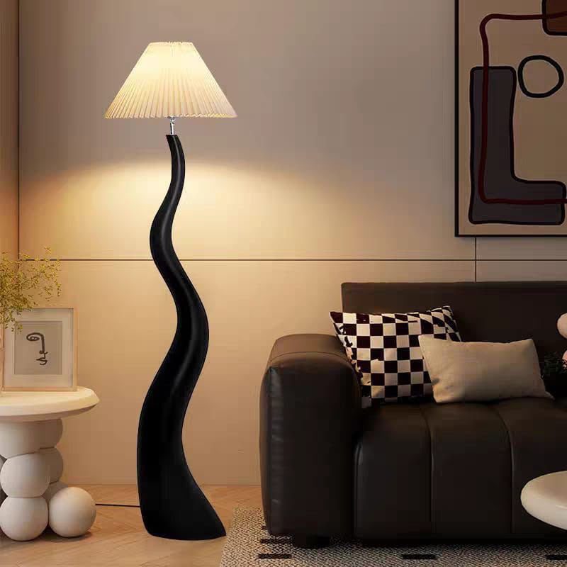 Curved floor lamp with a fabric drum shade